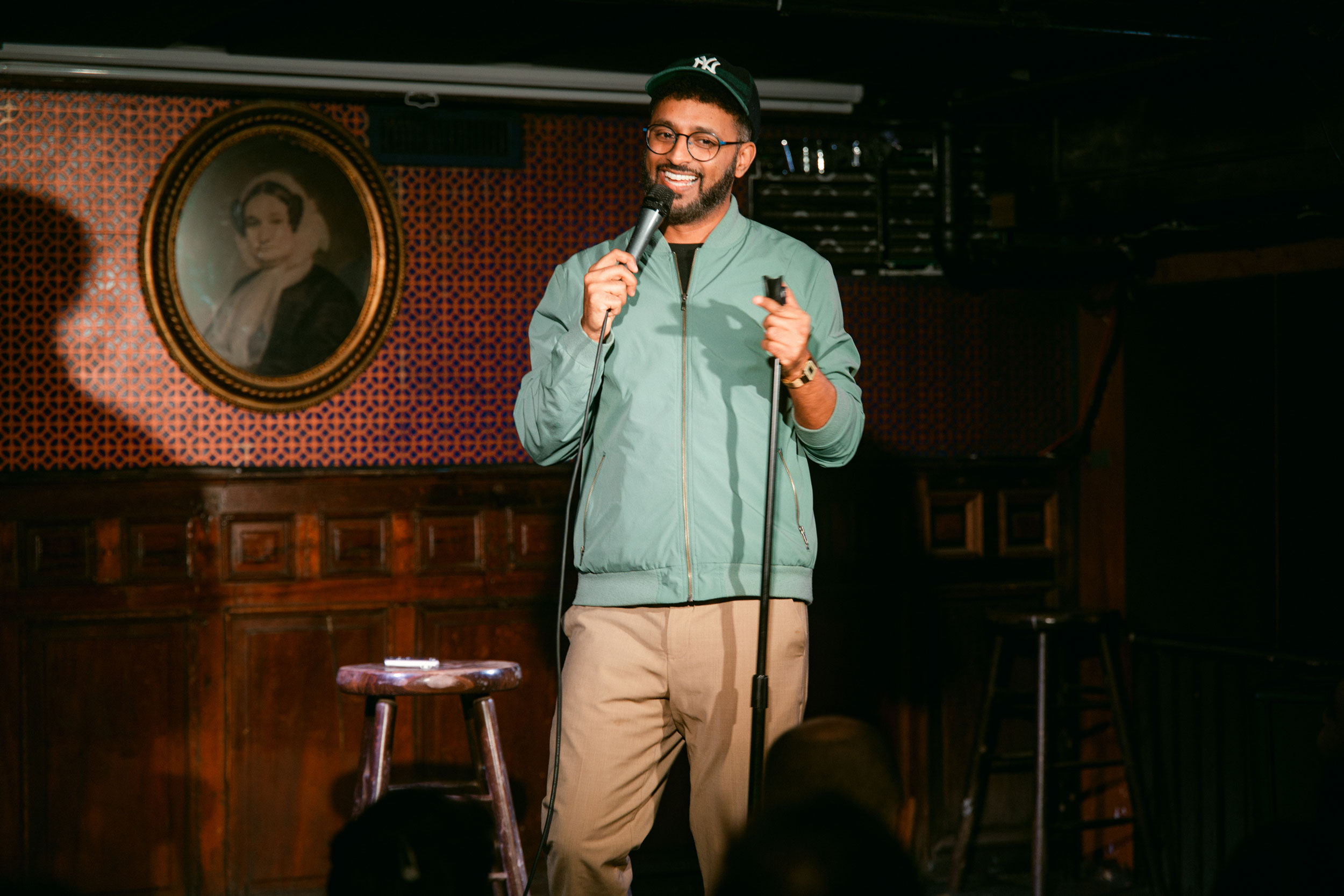 Comedian Ali Sultan performing on the Union Hall stage in Brooklyn, NY.